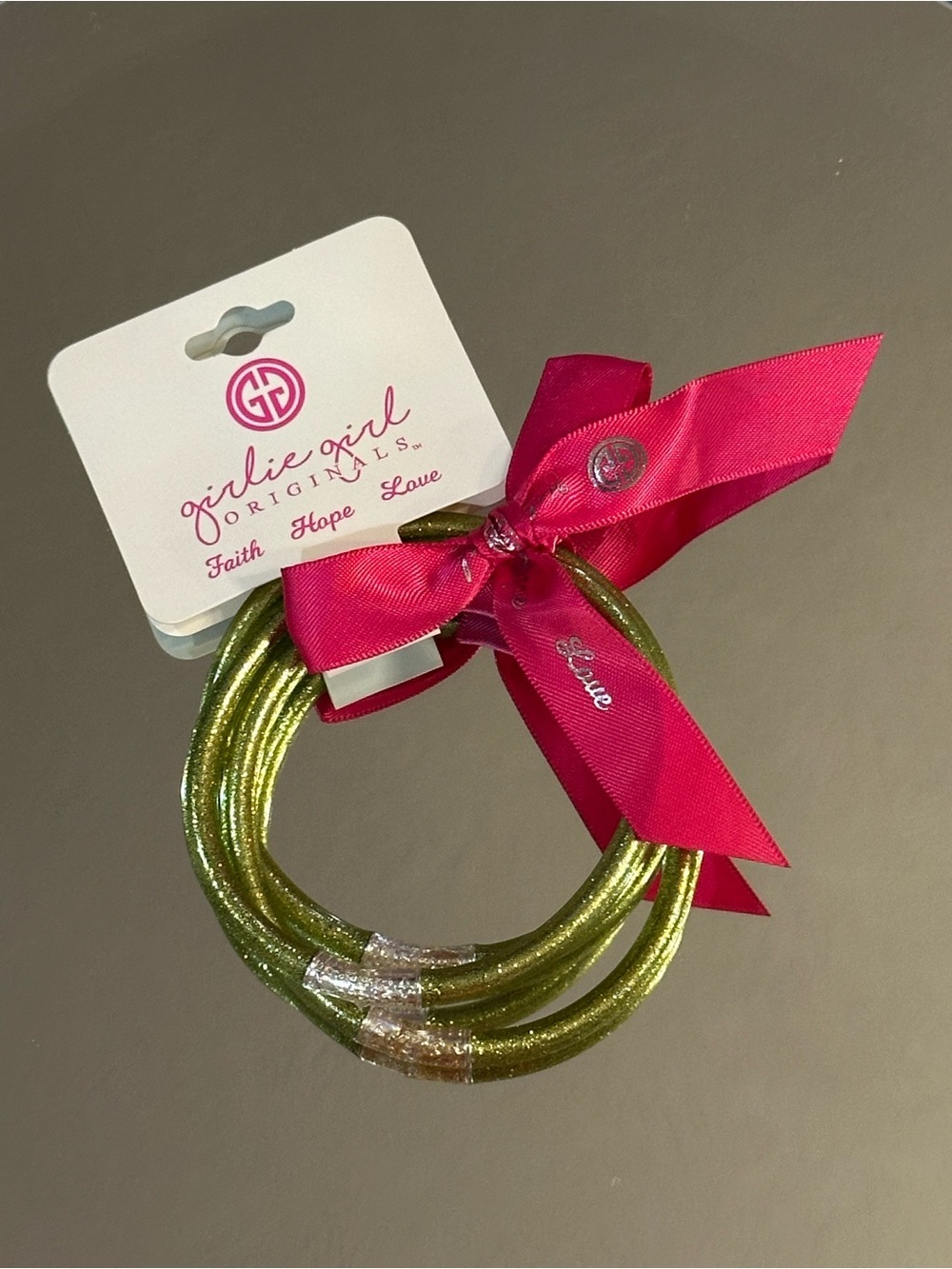 Girlie Girl Originals. 3 Glittery Green Bracelets with Pink Ribbon. (NWT)